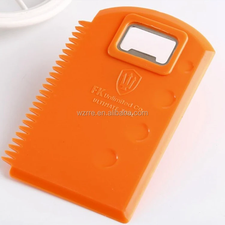 Plastic surfing surfboard wax comb with bottle opener
