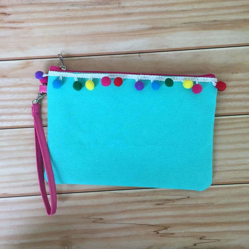 Hot selling canvas monogram good quality pom pom makeup bag cosmetic women clutch