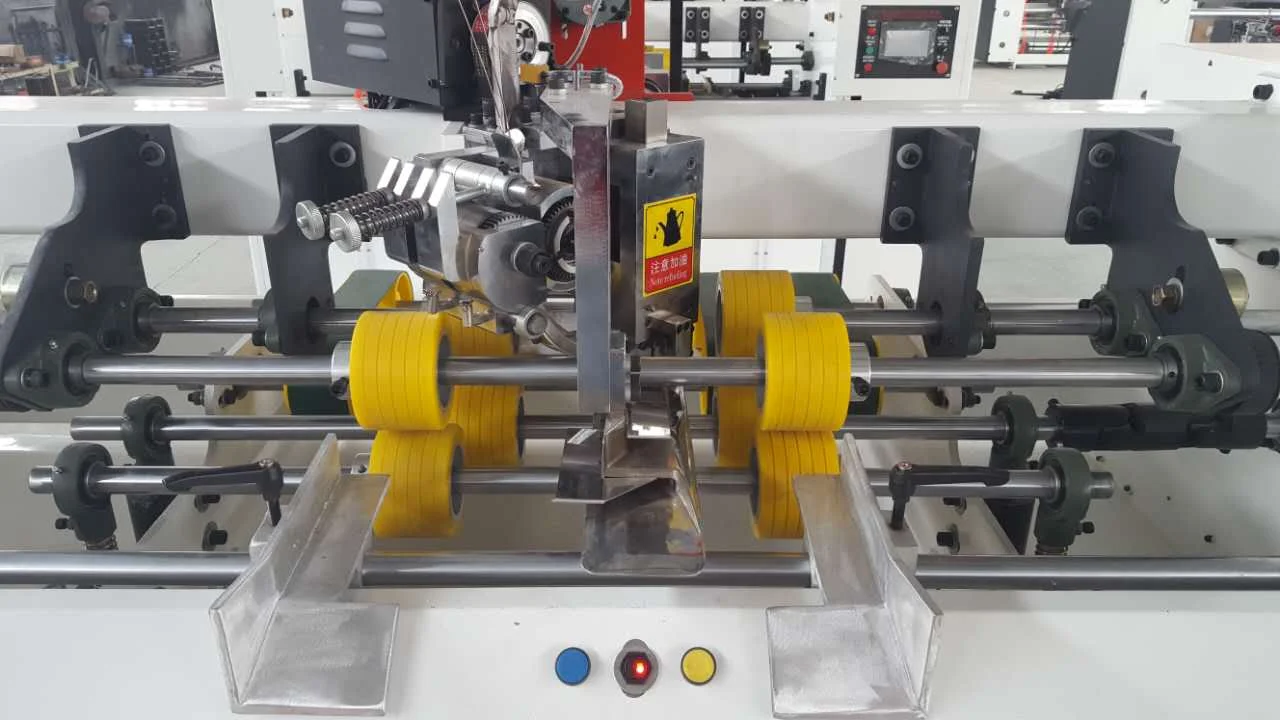 Cardboard box making machine stitcher