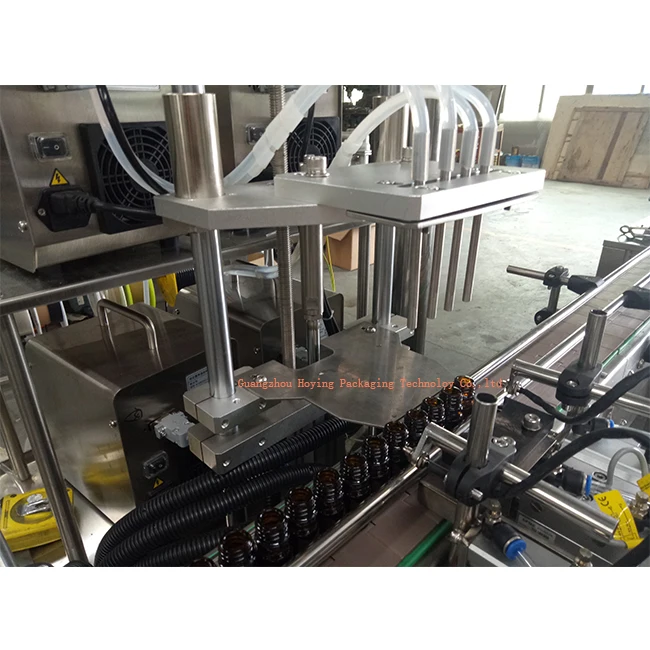 Medium capacity 1000 bottes/h automatic lotion bottle filling capping labeling machine