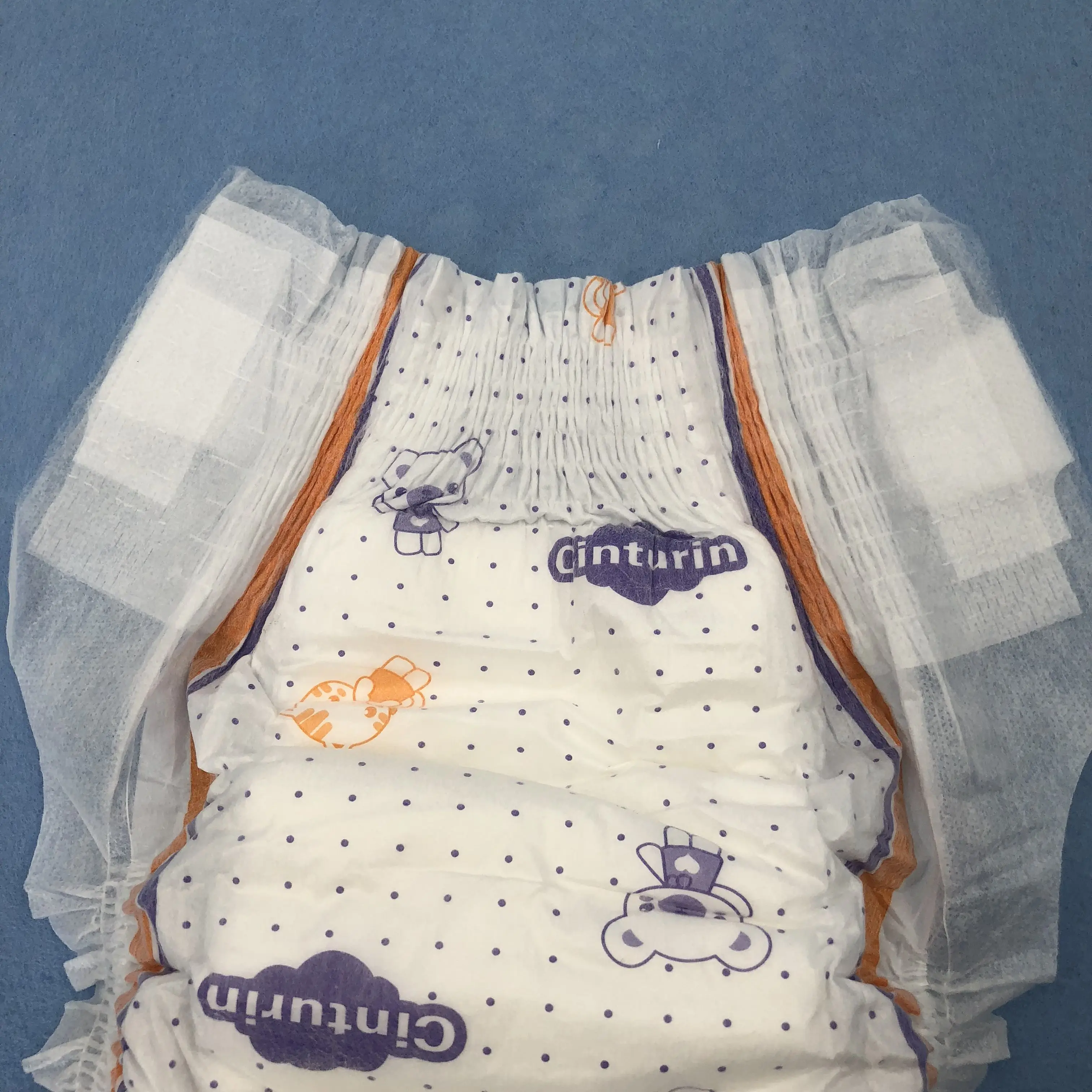 Low price disposable magic tape elastic waist band baby diapers manufacturer with OEM service
