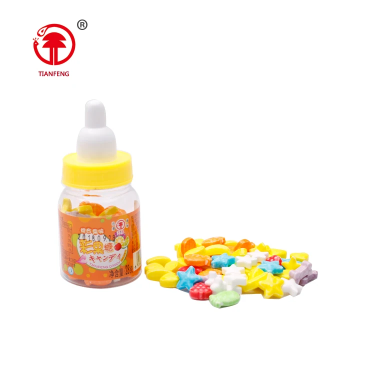 Confectionery toys hard press candy sweet halal chinese table press crayon candy with nipple packing