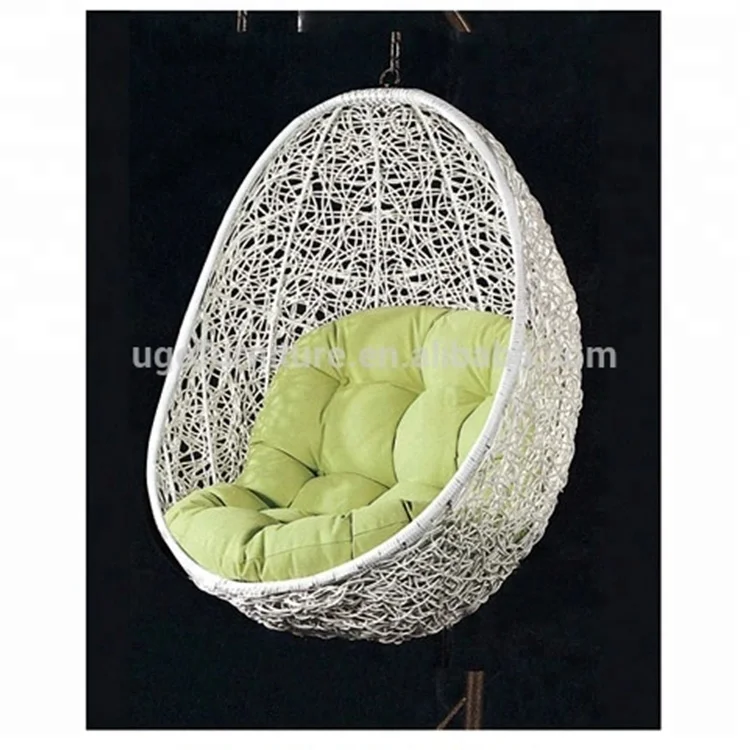 
Double sitting in outdoor wicker swing chair standing in beach hammock popular hammock 