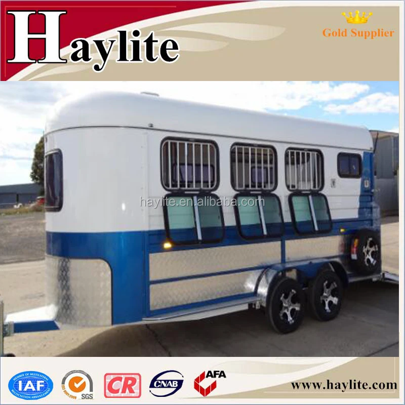 white gooseneck horse float with roof