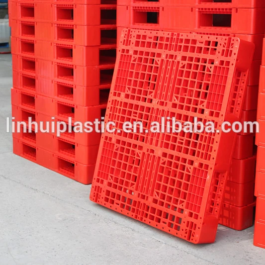 Red color single faced plastic pallet 1.00m x 1.20m that could work in racking system