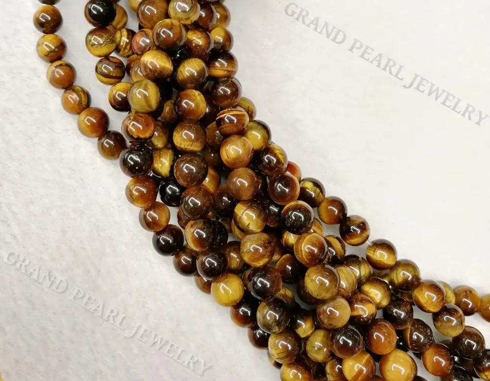 
Yellow / Brown Tigereye round beads in 16