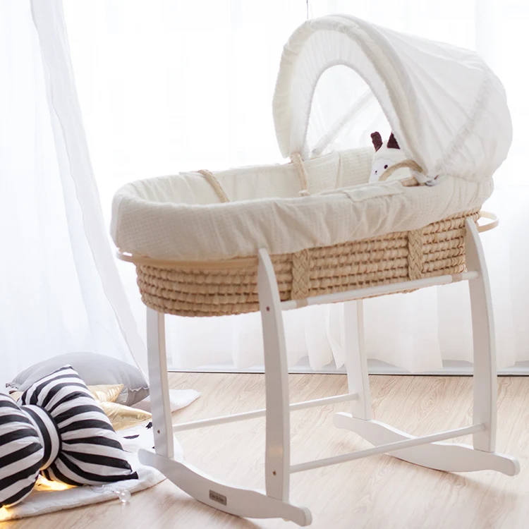 
high quality simple fabric of maize peel moses basket with rocking stand 