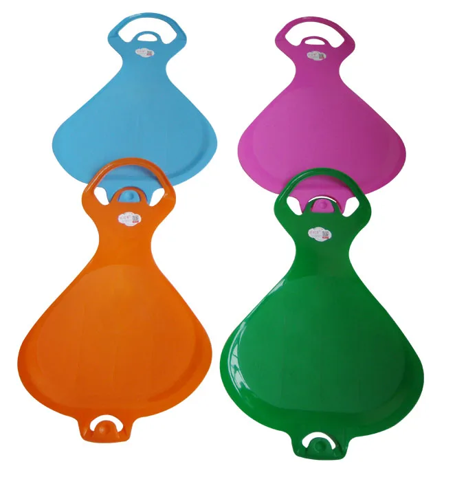 connected plastic kids adults snow slide board on grass and sand one by one