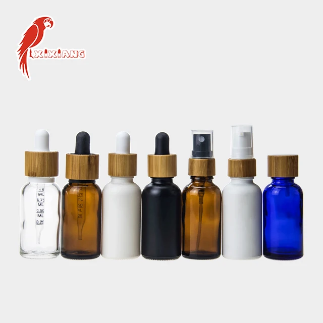
30ml CBD Blue Glass Bottle with wooden color Childproof Tamper Cap 