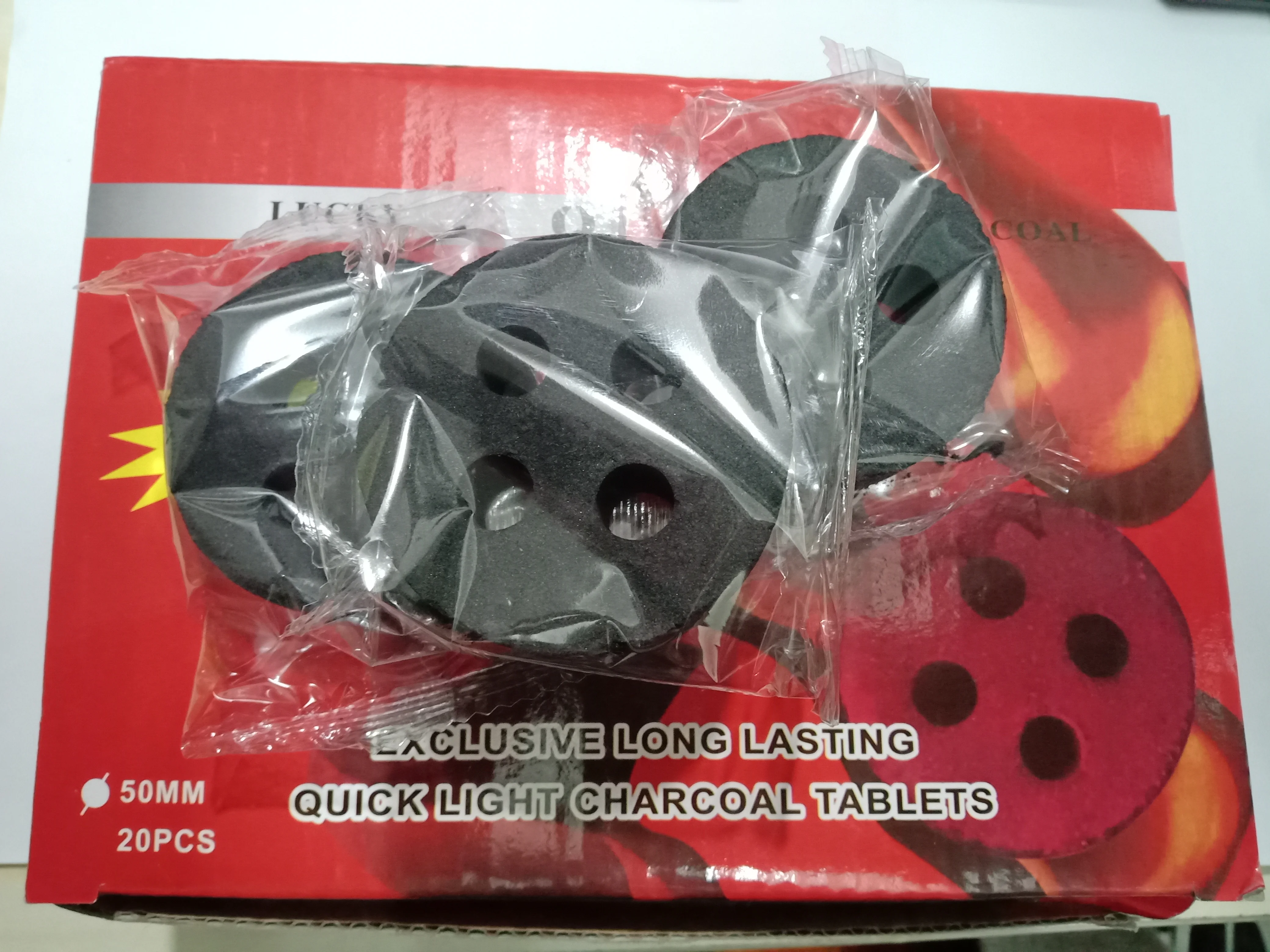 
Large Supply Activated Charcoal activated 4 hole charcoal shisha 100% coconut shell charcoal cubes 