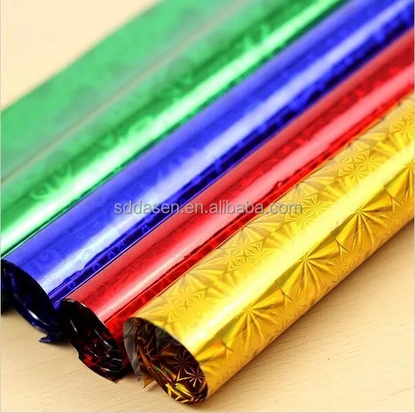 
gift wrapping with holographic metallized paper 