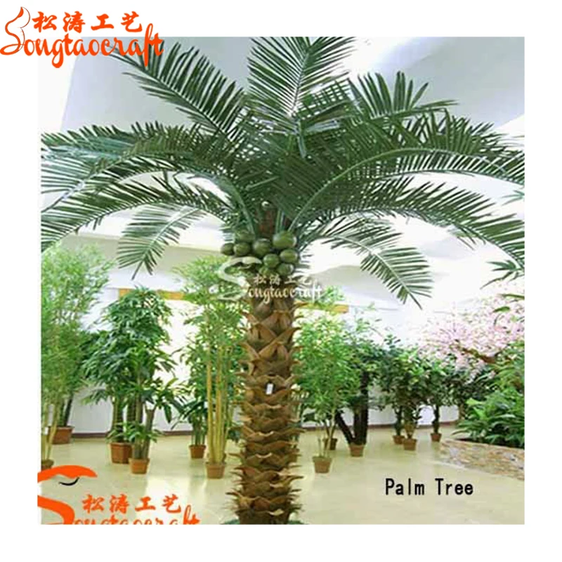 Artificial washingtonia palm tree with real bark and fake leaves