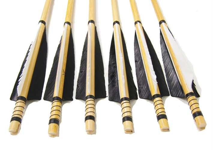 hunting wood arrows handmade wooden arrow shafts white and black plain feathers silver arrow tips archery traditional  hunting