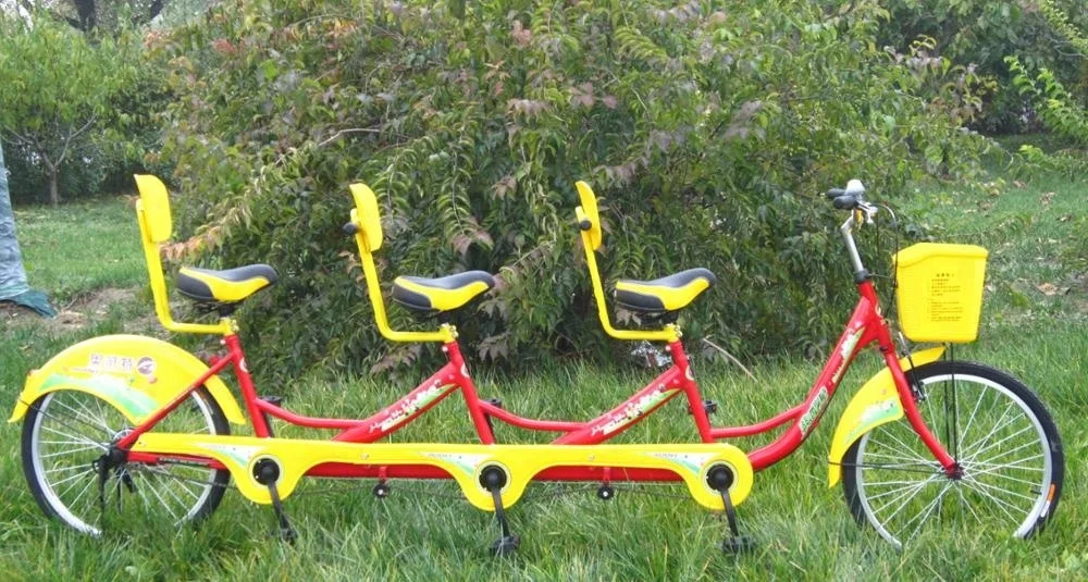 tandem bike with three seats for funny sightseeing tour and cycling