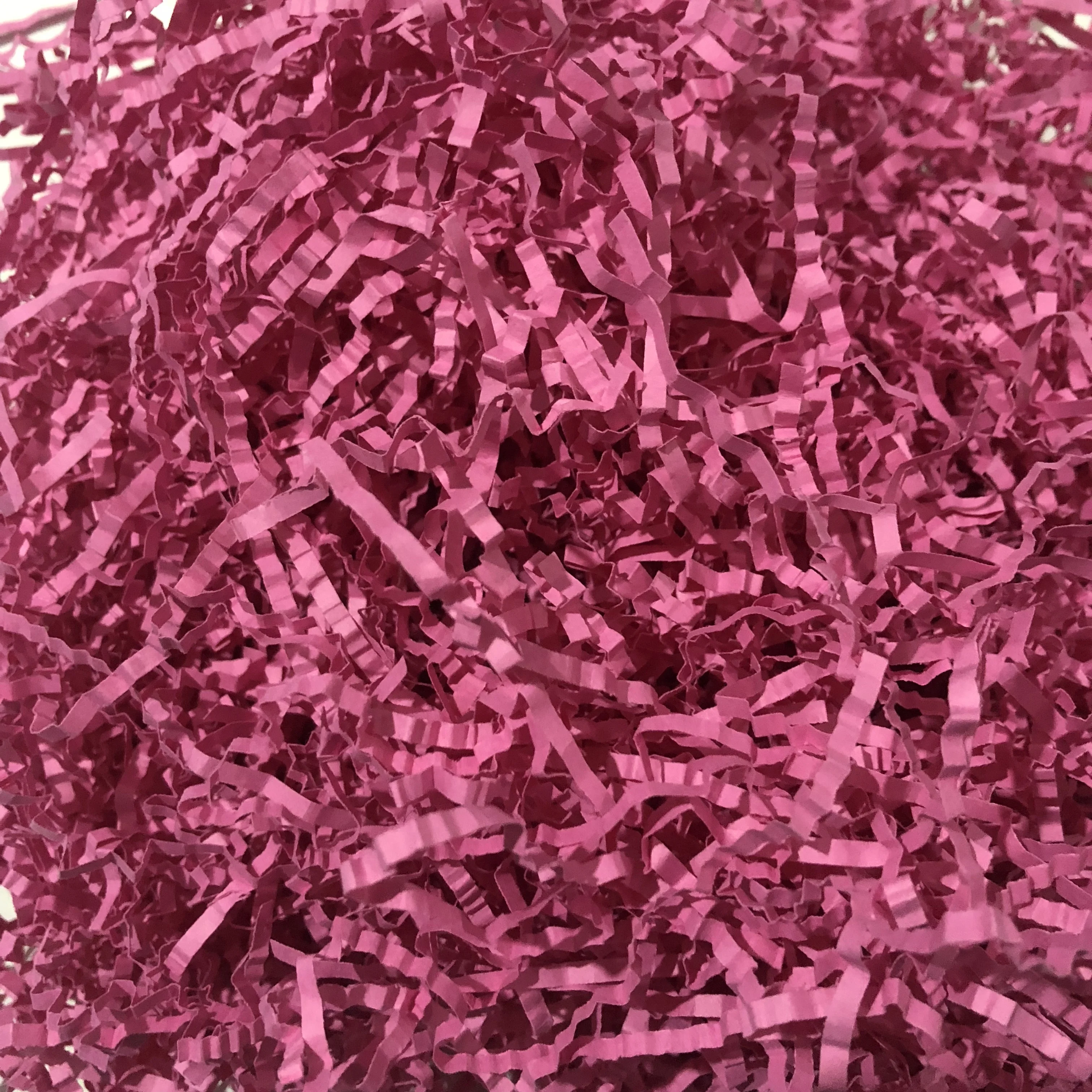 Rose color shredded paper as filler