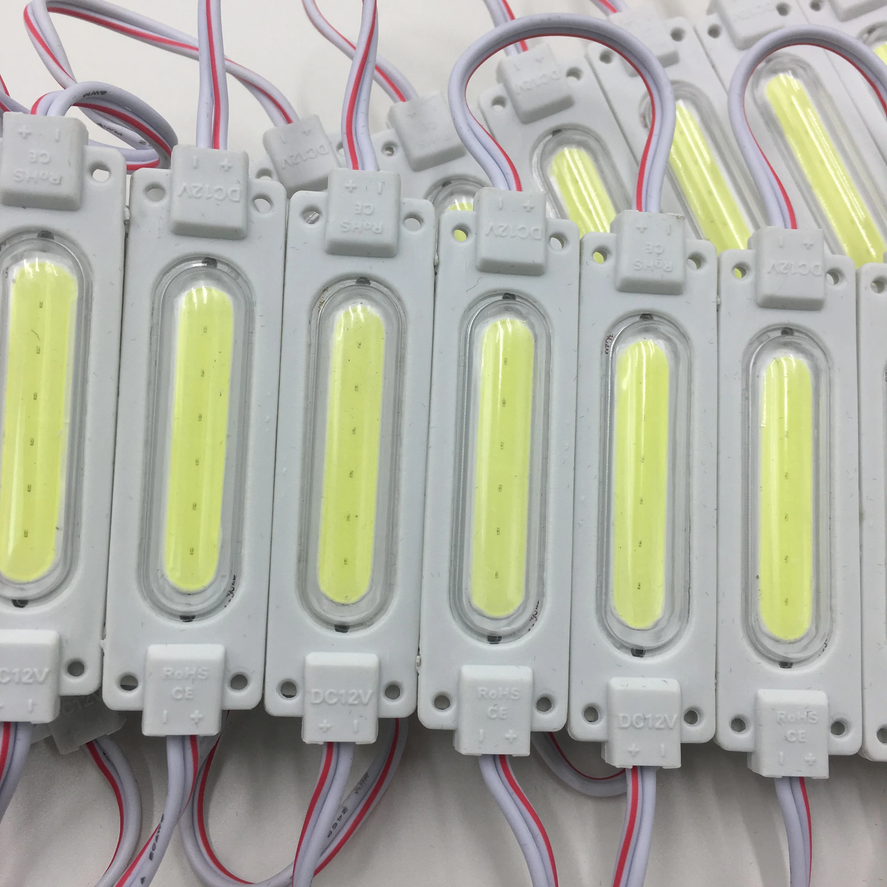  Пользовательский 24V-образный впрыскивающий светодиодный модуль cob для