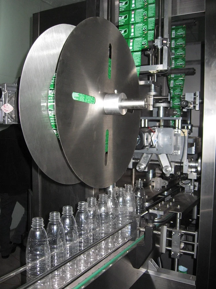 
Zhonghuan sleeve inserting machine automatic labelling machine 