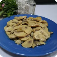 champions mushroom in jar, fresh canned mushroom pieces, canned king oyster mushroom
