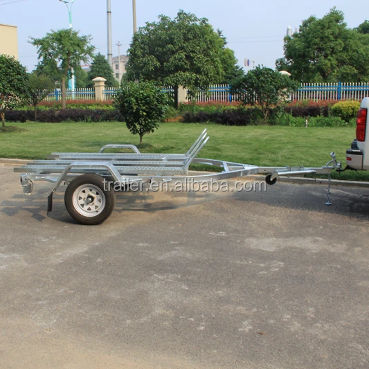 3 Motorcycles Transporting Trailer