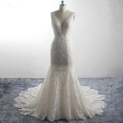 LZ300 Sleeveless Fan Tail Bridal Gown Light Champagne Deep V Neck Blinking Sequin Mermaid Wedding Dress