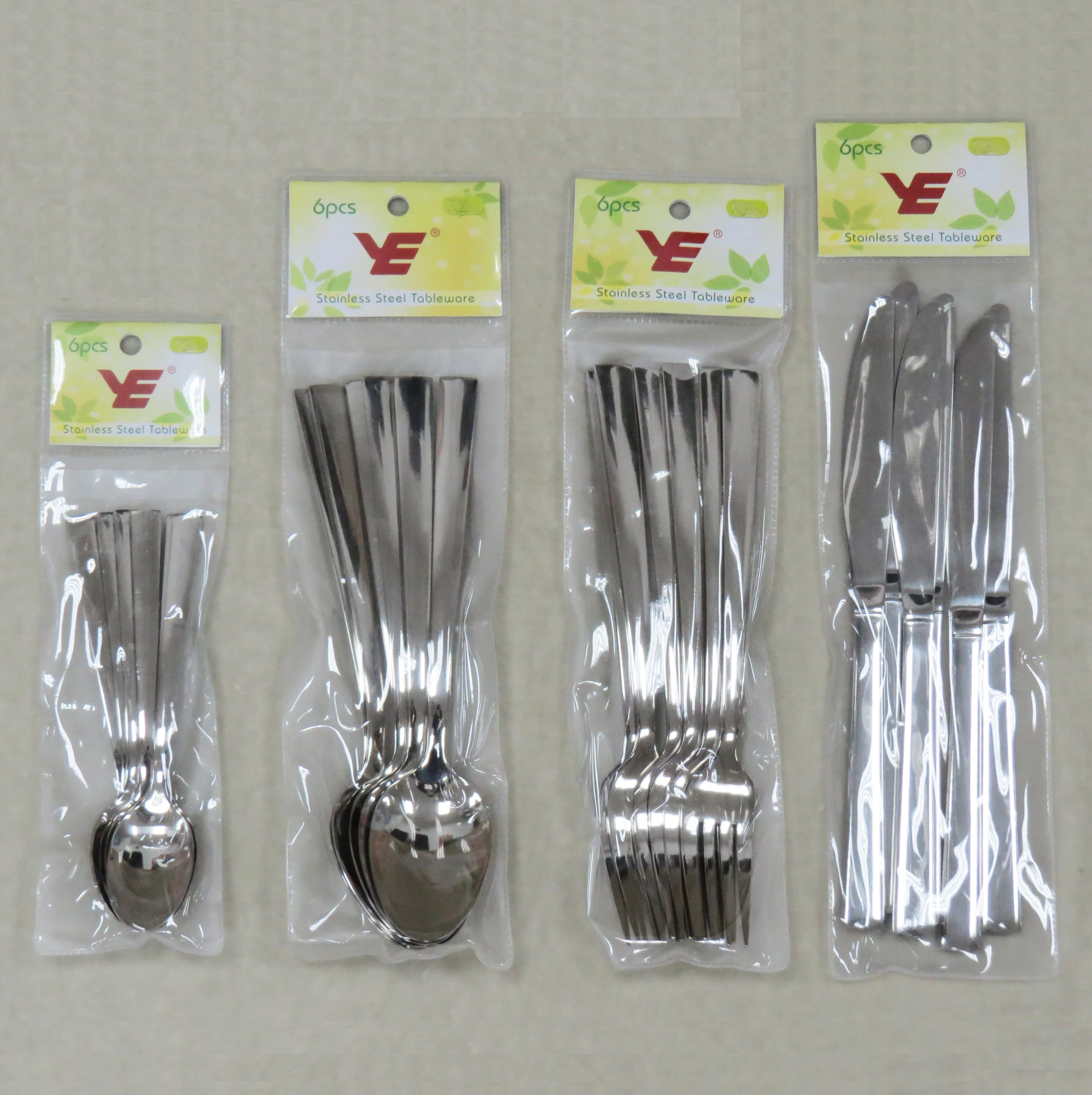 6pcs stainless steel cutlery set with Gold and Laser pattern in plastic bag with tie card for supermarket