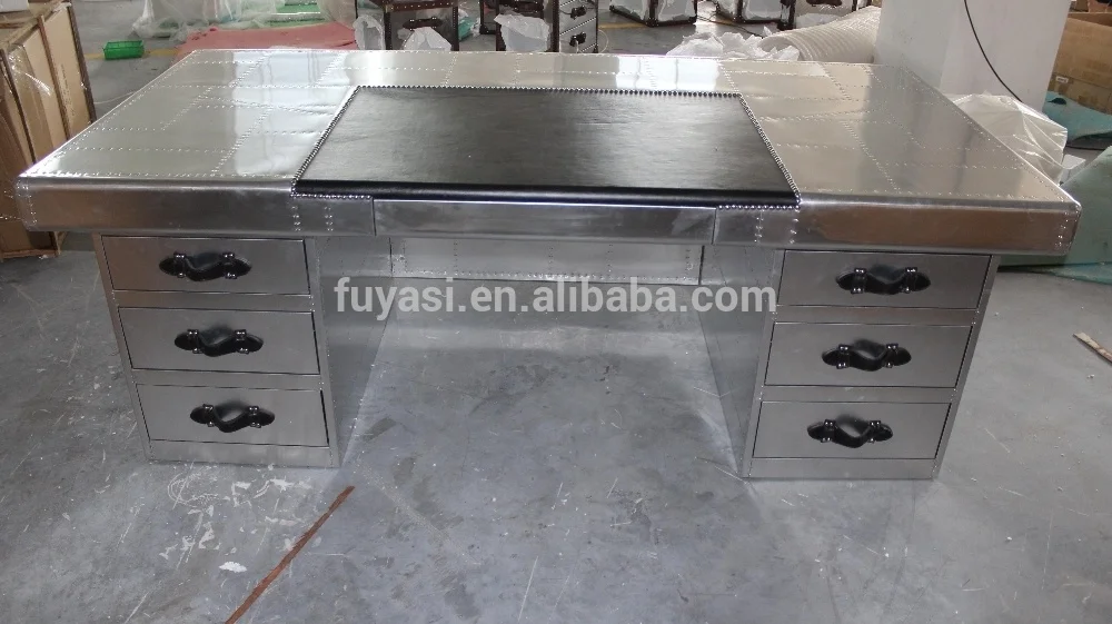 
aviator aluminum and leather covering office desk 
