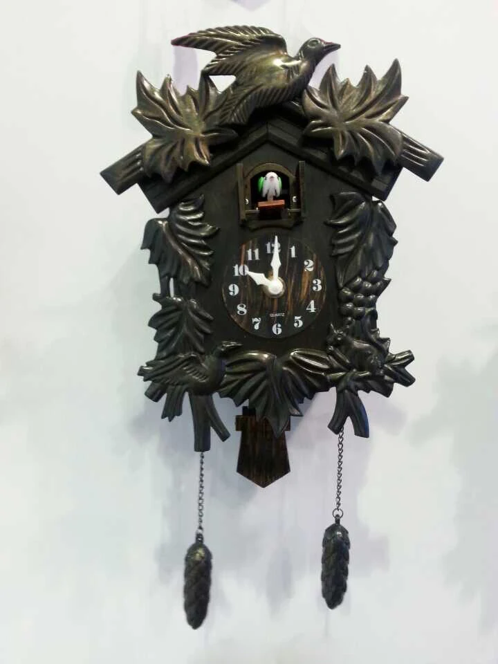 Plastic cuckoo clock with bird sound music