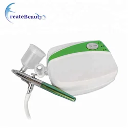 Cake decorating airbrush with compressor
