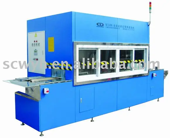 Automatic ultrasonics and pressure spray cleaning machine