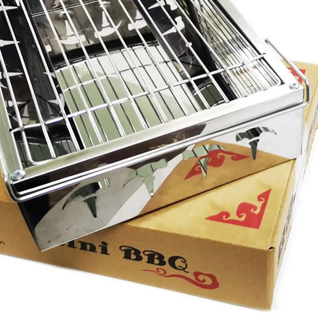 
Camping disposable portable foldable stainless steel mini bbq charcoal grill stove on table 