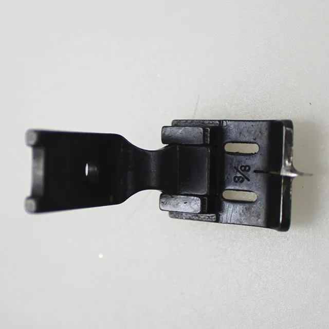 Sewing foot for double needle lock stitching machine