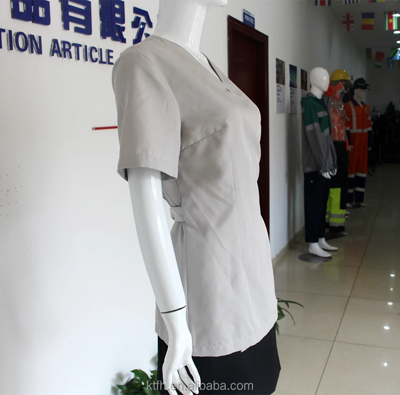 Fashionable stylish hair dressers make up nail artist profession wrap work tunic