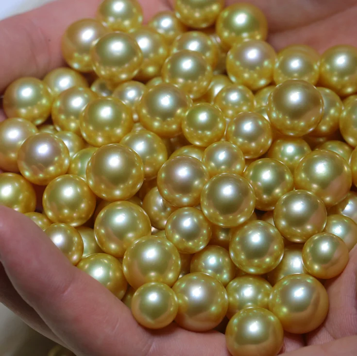 10-11mm 3A grade large big size supply wholesale gold golden color real genuine natural south sea pearls