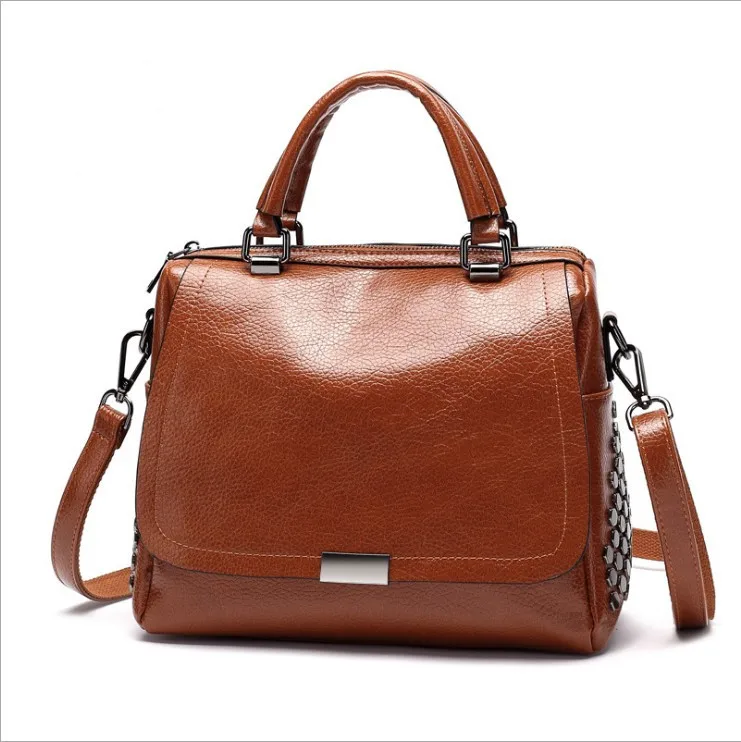 generation of handbags new European and American Boston pillow bag retro fashion handbag rivet Messenger shoulder bag