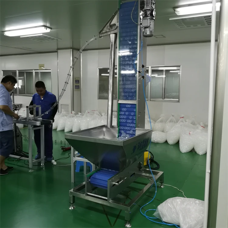 Full Automatic Vibratory Silicone Flower Cap Feeder Machine For Sale