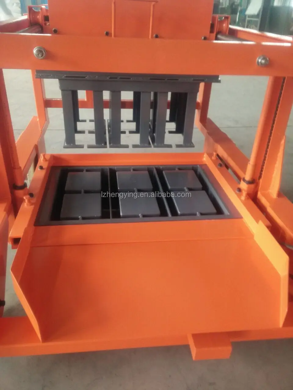Concrete block making machine