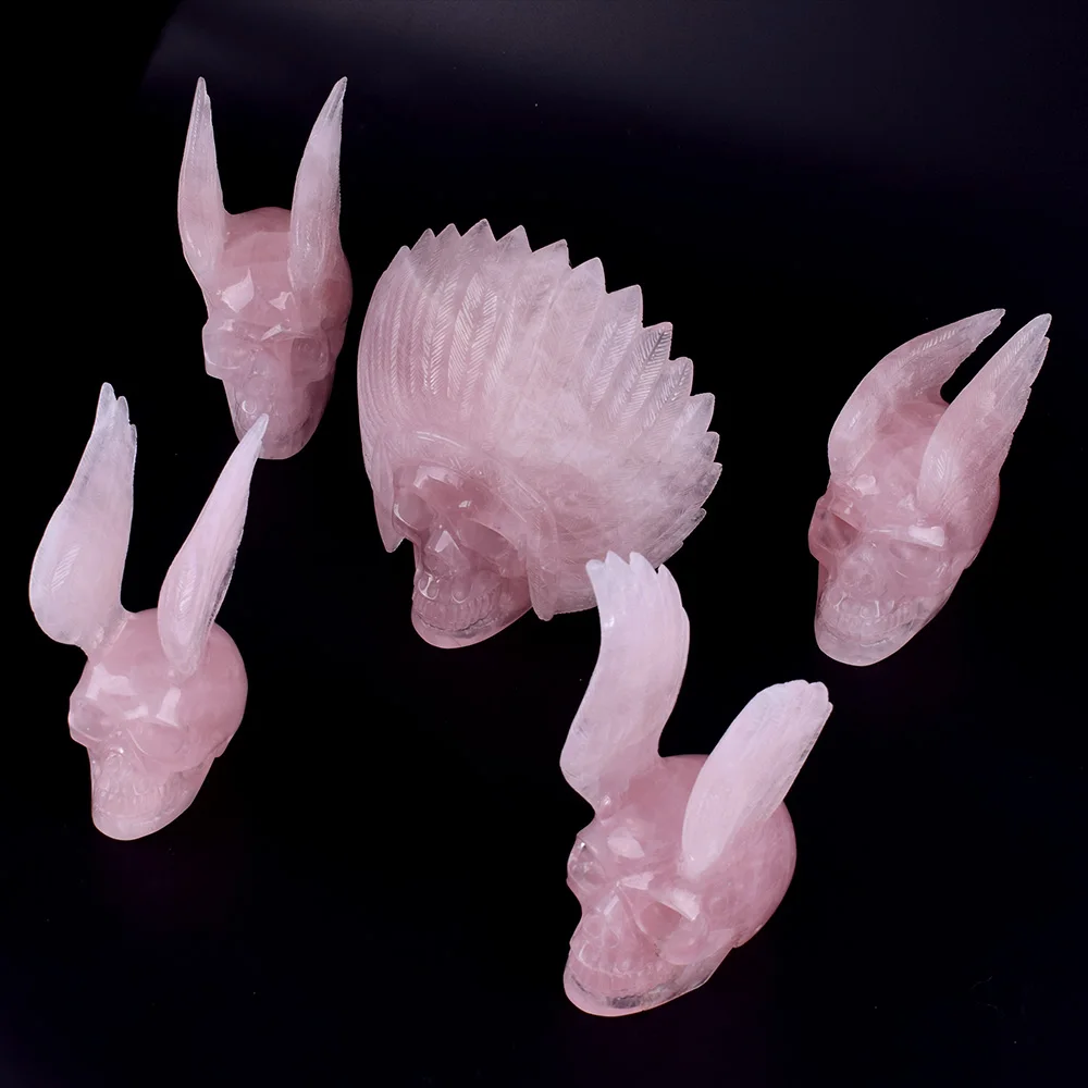 Natural rose quartz crystal hand carved Alien and Wing skull Sculpture for sale
