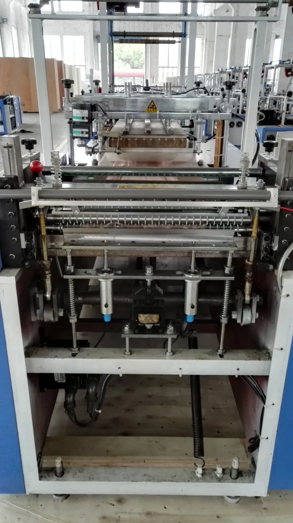 China Zhangjiagang fully automatic long sleeved glove making  machine