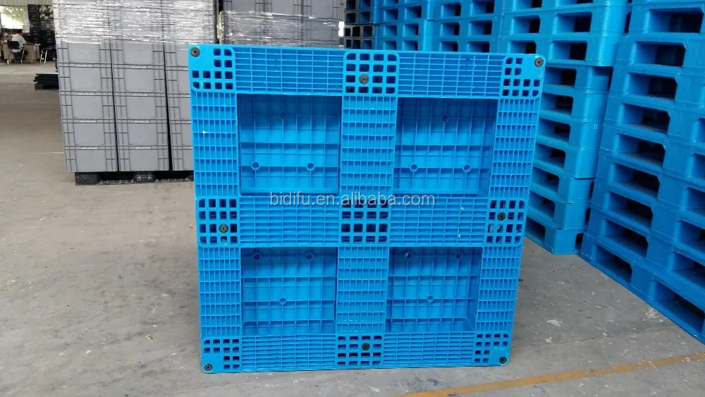 Cross bottom flat surface dynamic 2T plastic pallets