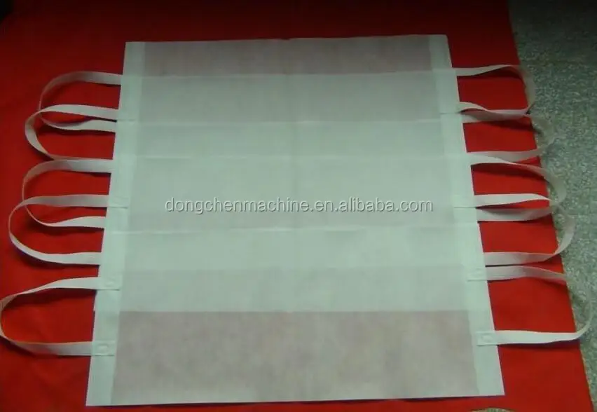 Automatic handle attaching and latitude cutting non woven bag making machine