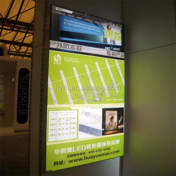 
white color LED lights behind textile graphic panel 