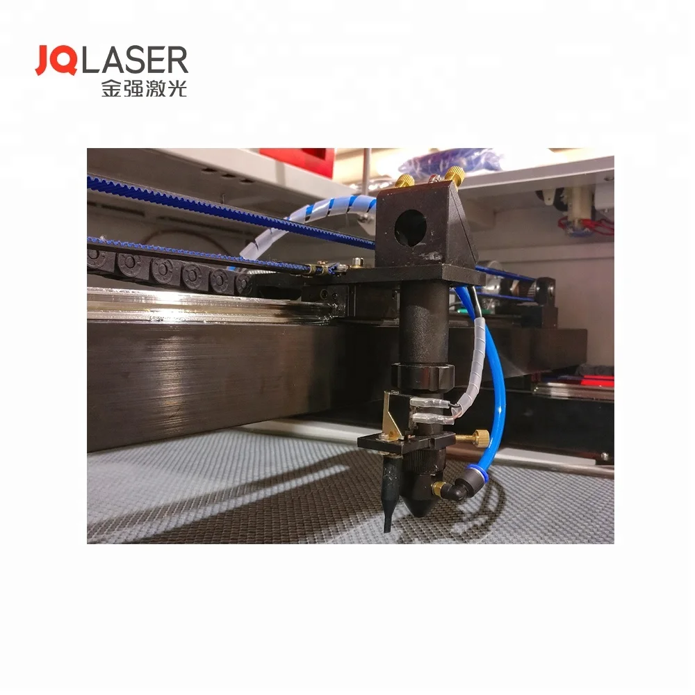 JQ Jinan Jinan Easy operation and hot sale blue and white MDF/wood CO2 laser engraving machine price 2600-3000USD