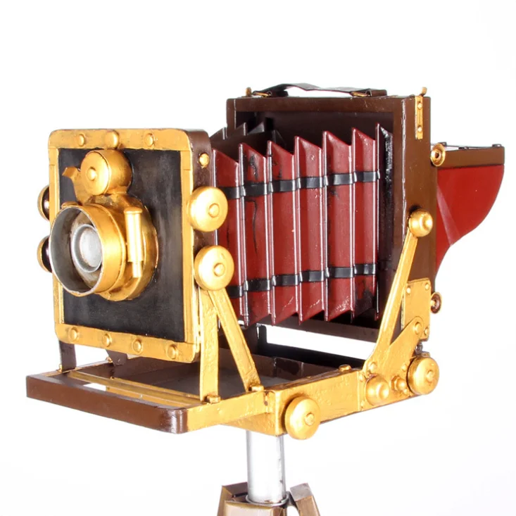 Vintage iron tripod camera model