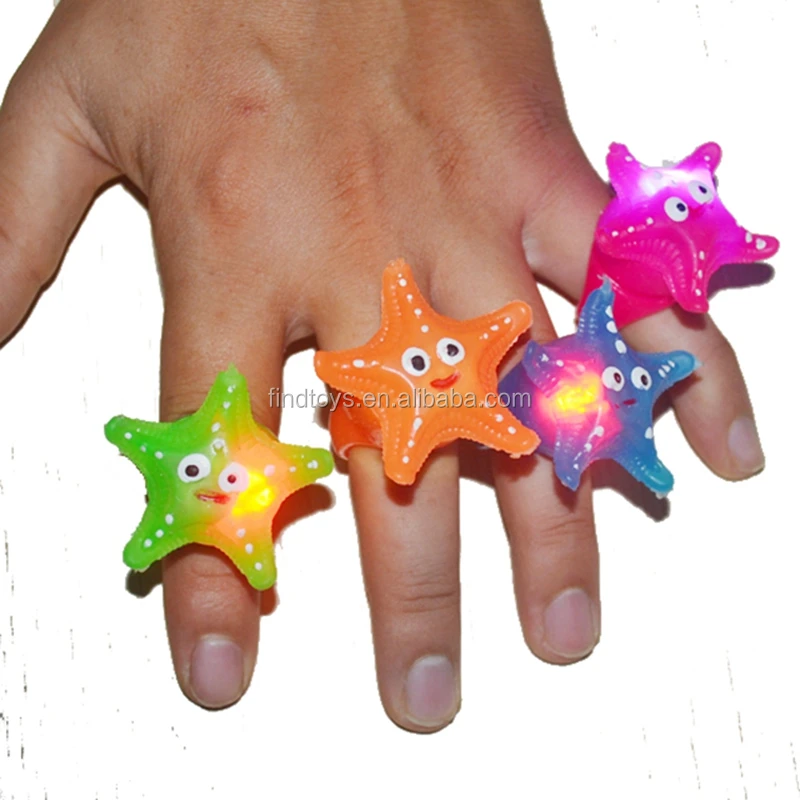 Chinese Wholesale Fashion LED Starfish Ring Christmas Toys Light Up Rubber Blinking Flashing microscope LED Finger Ring