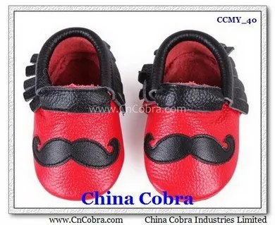 
CHINA COBRA top quality soft sole leather baby moccasins shoes without the characters on them with fringe on them 