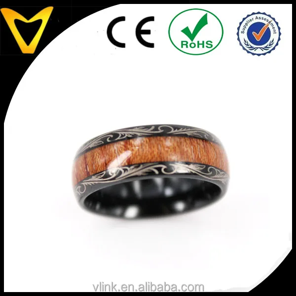 Koa wood inlay black tungsten wedding ring with floral logo lasered on edges koa wood inlay tungsten carbide ring