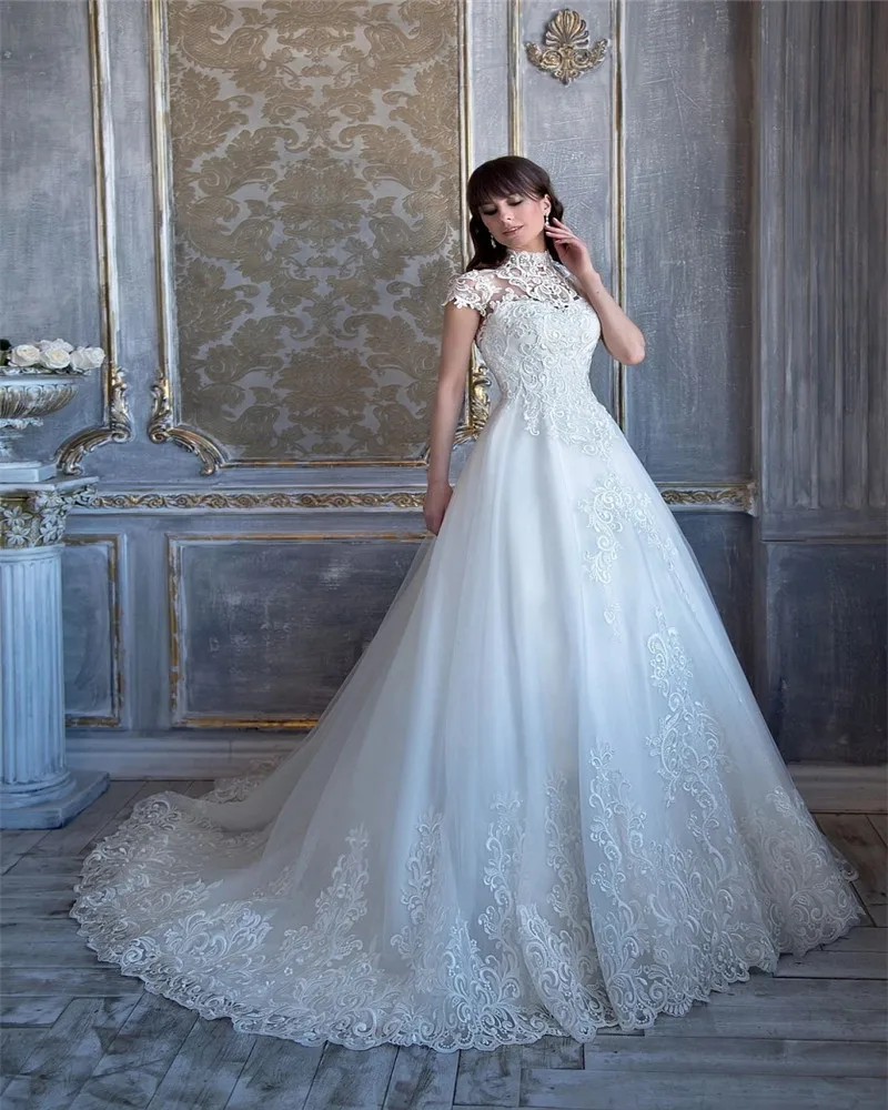 2021 Elegant High Collar Wedding Dresses A Line Cap Sleeve Lace Applique Vintage Wedding Gowns Buttons Sheer Back Bridal Gowns