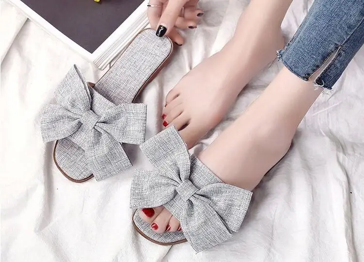 Classic bowknot design ladies indoor and outdoor comfortable soft rubber slippers