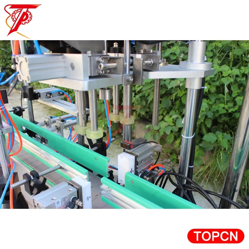 Trigger honey auto twist off lug capping machine with vibrating cap feeder