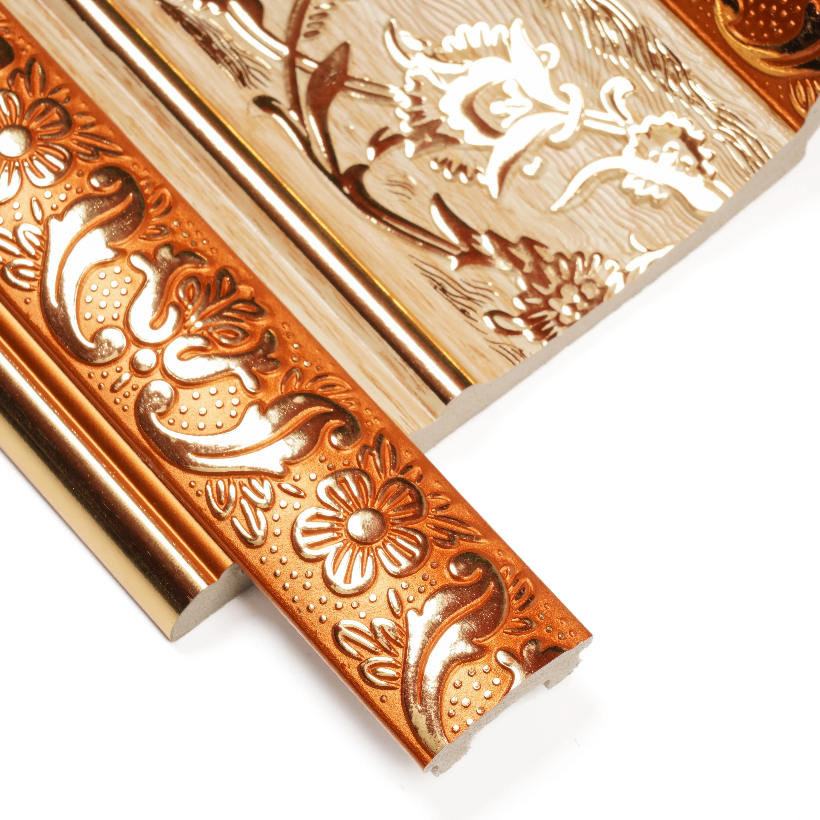 Polystyrene extruded interior mouldings with inserts